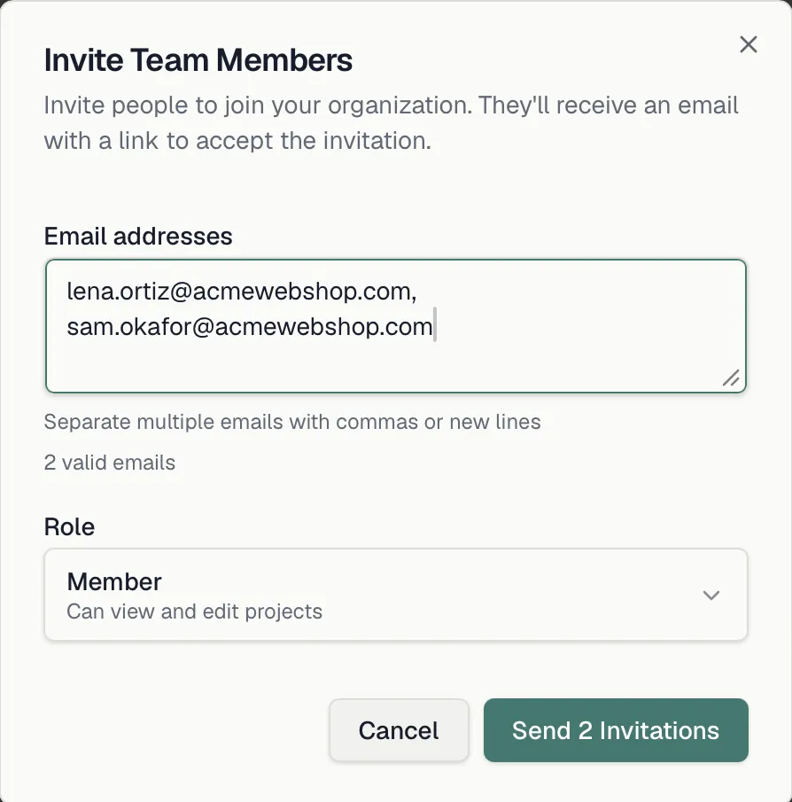 The Invite Team Members dialog with multiple emails and role selection
